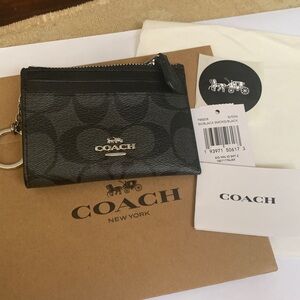 New Coach Signature Black Card Holder wallet with key chain.